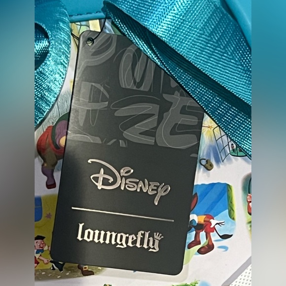 NWT-Loungefly/Disney’s Pinocchio painting AOP mini backpack - Picture 10 of 11